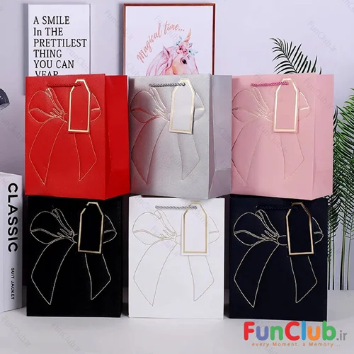 بگ کادویی طرحدار دیزاین چرم پاپیون طلاکوب (دارای سایز و رنگبندی) - شروع قیمت از: